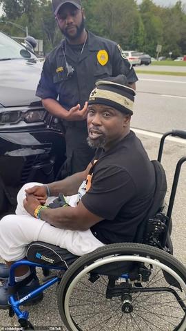 Were handcuffs placed on the man while he was still in his wheelchair?